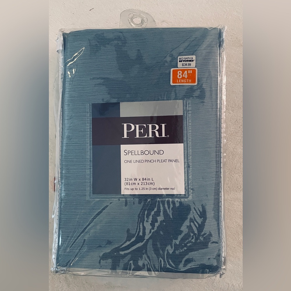 This is a Peri Spellbound One Lined Pinch Pleat Panel curtain. 32x84
